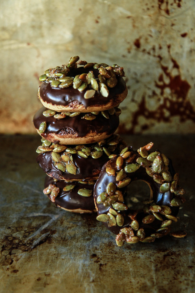 Pumpkin Ginger Donuts with Chocolate Ganache and Candied Pepitas- Vegan and Gluten Free