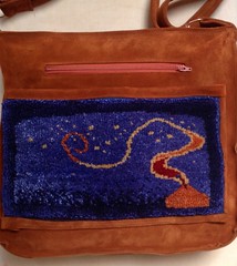 leather and silk pile bag