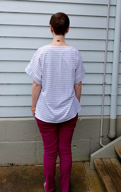 A woman wears Style Arc Elle Pant in berry and Named Sointu Tee in stripes