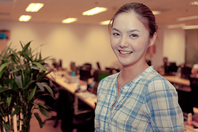 Lovely office worker with a bright smile.