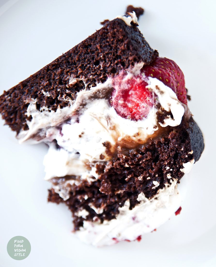 Vegan carob layer cake (tort) with coconut whipped cream, strawberries and rhubarb