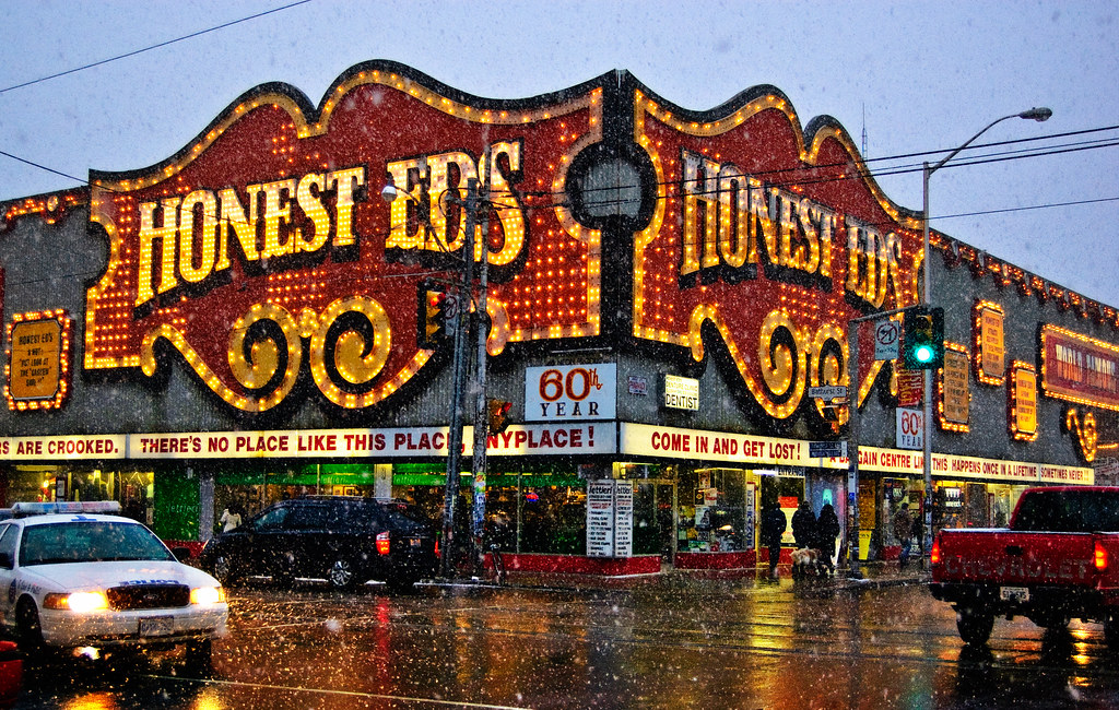 Snowing. Walking by Honest Eds