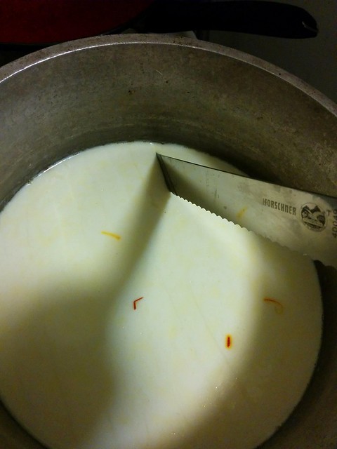 Cutting curds with saffron in them