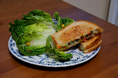 Muffuletta-Style Grilled Cheese Sandwiches with Baby Romaine & Pistachio Salad