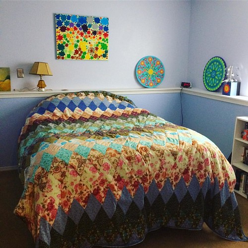 The quilt I made my mother looks pretty good in our guest room.