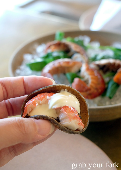 Red claw yabbies with lemon jam and cultured cream in a buckwheat pikelet at Bennelong Restaurant Sydney