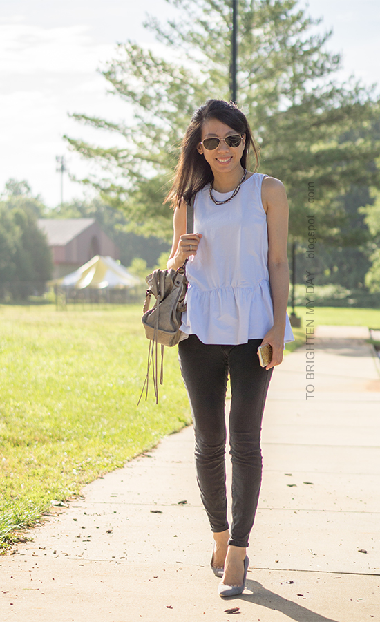 woven necklace, light blue sleeveless peplum top, black jeans, gray suede pumps, stacked rings
