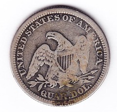 J.W. Millar countermark on U.S. aurter reverse